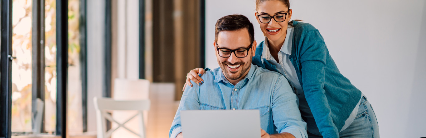 Couple working on laptop