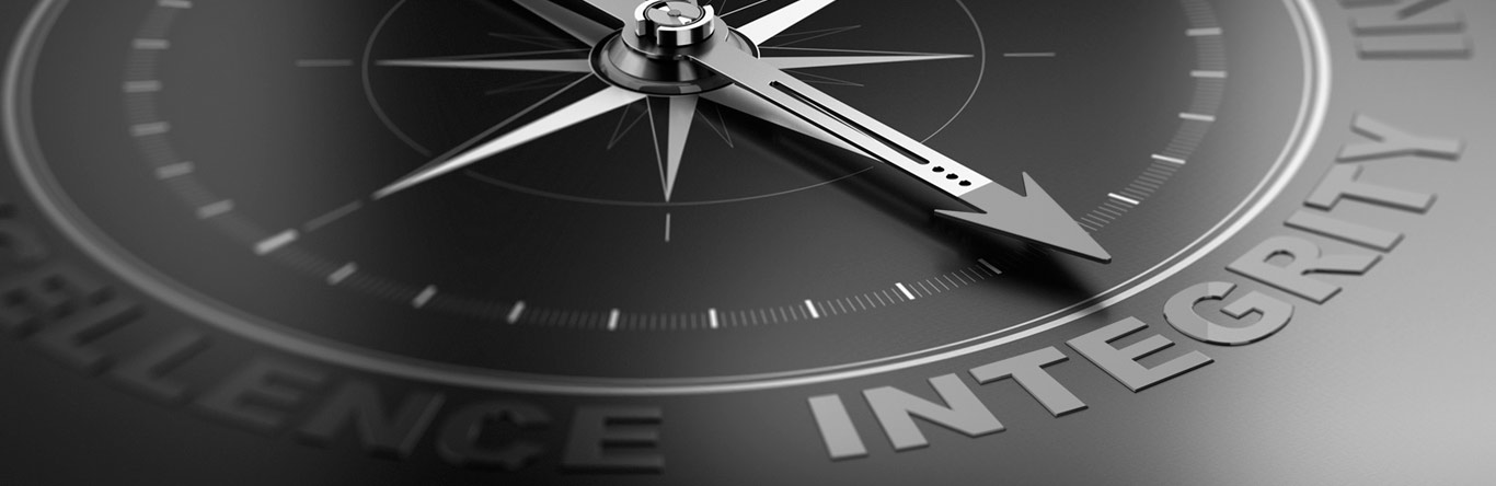 grey compass pointing to intergity